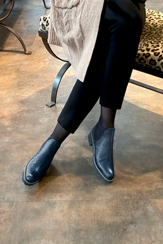 Denim blue women's ankle boots, with elastics. Round toe. Low rubber soles. Worn view - Florence KOOIJMAN